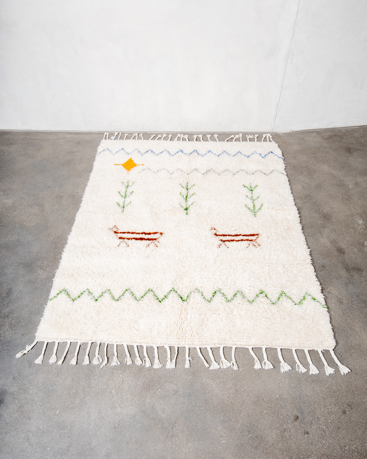 Modern, designer, handcrafted Berber rug from Morocco. Beniourain carpet with beautiful colours and patterns and fluffy wool texture.